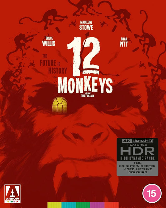 Blu-ray of the movie "Twelve Monkeys" in a vivid red hue featuring the silhouette of a monkey's face, with film title centrally placed and top-billed actors Bruce Willis, Madeleine St