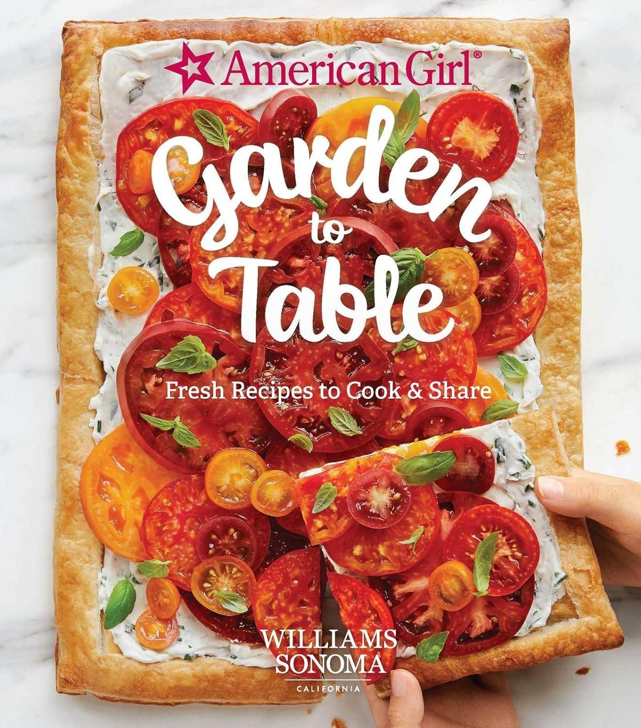 Cover of "American Girl: Garden to Table: Fresh Recipes to Cook & Share" cookbook by Williams Sonoma Test Kitchen, featuring a colorful tomato tart held by hands against a white background, ideal for teaching kids kid-friendly recipes and cooking skills