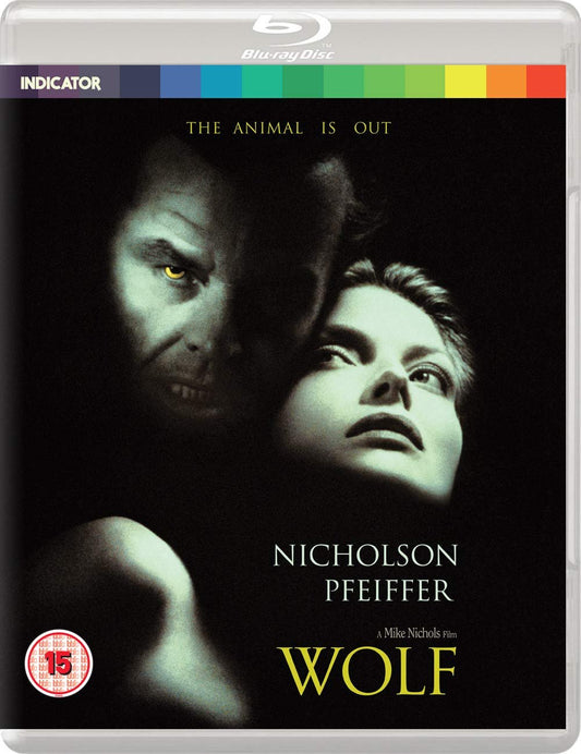 Blu-ray cover of the modern-day werewolf movie "Wolf" featuring intense, contrasting portraits of Jack Nicholson and Michelle Pfeiffer above the movie title, with a tagline "the animal is achieved.