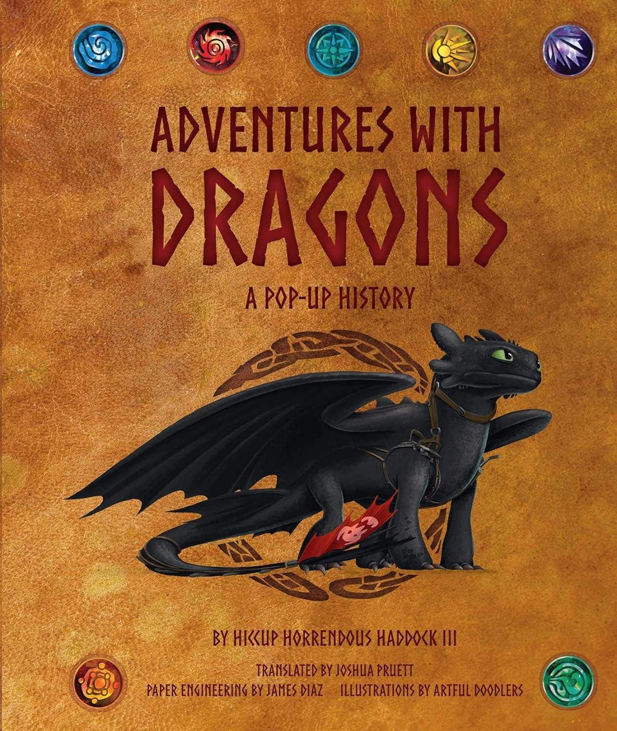 Book cover titled "DreamWorks Dragons: Adventures with Dragons: A Pop-Up History," featuring a black dragon perched on a globe, with colorful icons around the border. Written by Joshua Pruett (Author), James Diaz