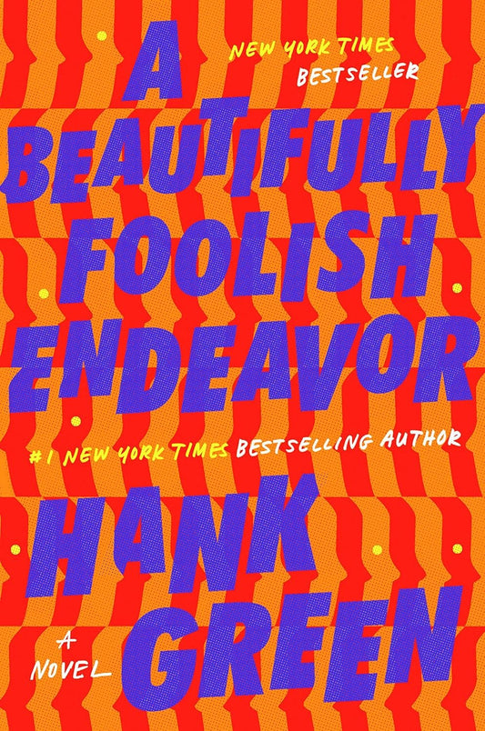 Book cover of "A Beautifully Foolish Endeavor: A Novel (The Carls)" by Hank Green, featuring bold text over a vibrant red and orange wavy pattern background. Highlights 'New York Times Bestseller' status at Hank Green (Author).