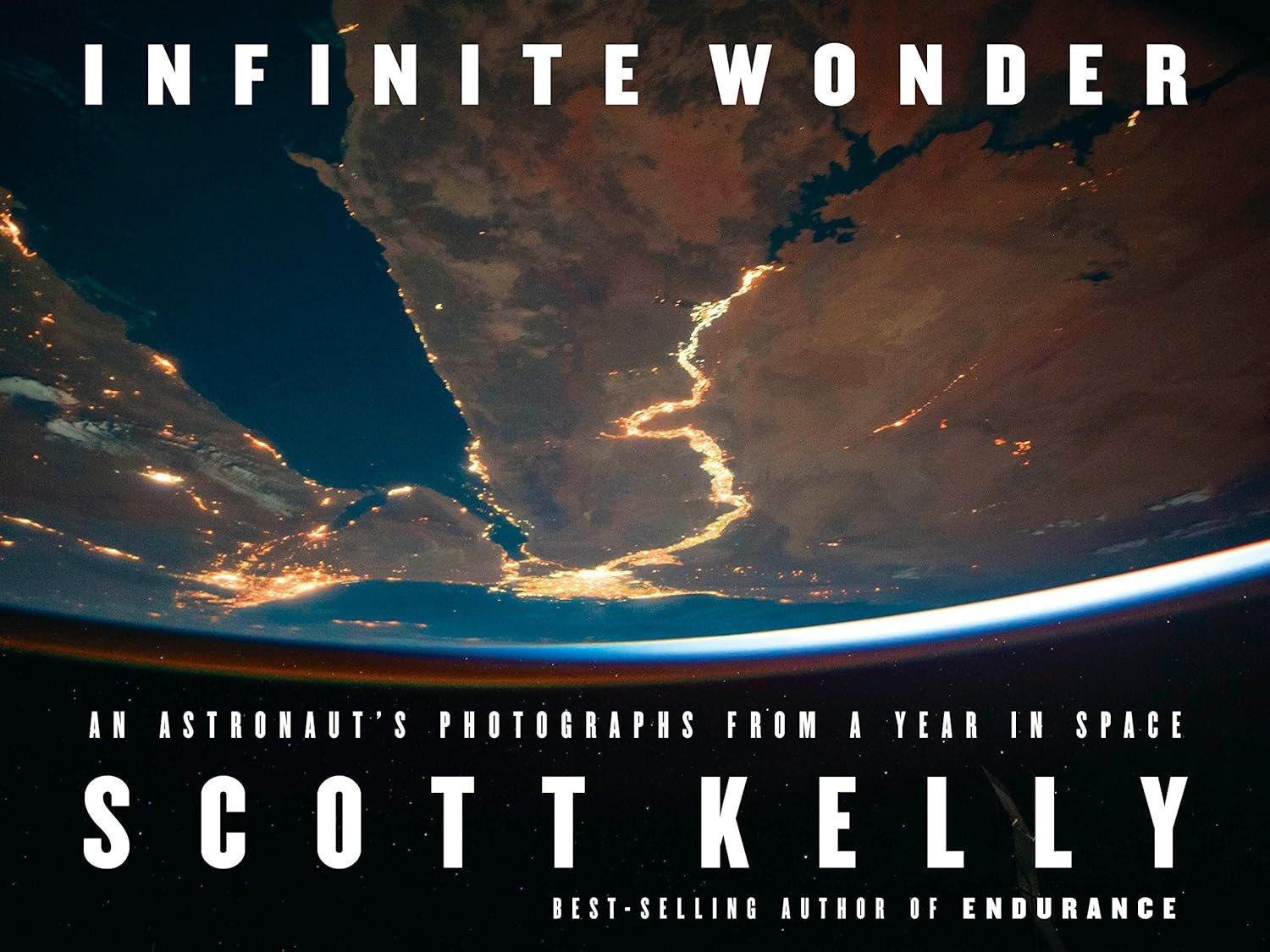 Infinite Wonder: An Astronaut's Photographs from a Year in Space - Used Like New - ZXASQW Funny Name. Free Shipping.